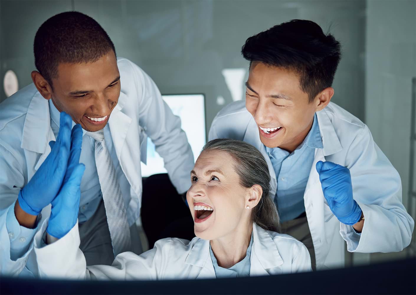 Happy scientists who measured samples fast and accurate Happy scientists who measured samples fast and accurate